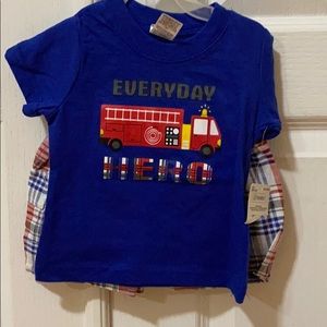 New with tags. 2 piece shirt and shorts set.